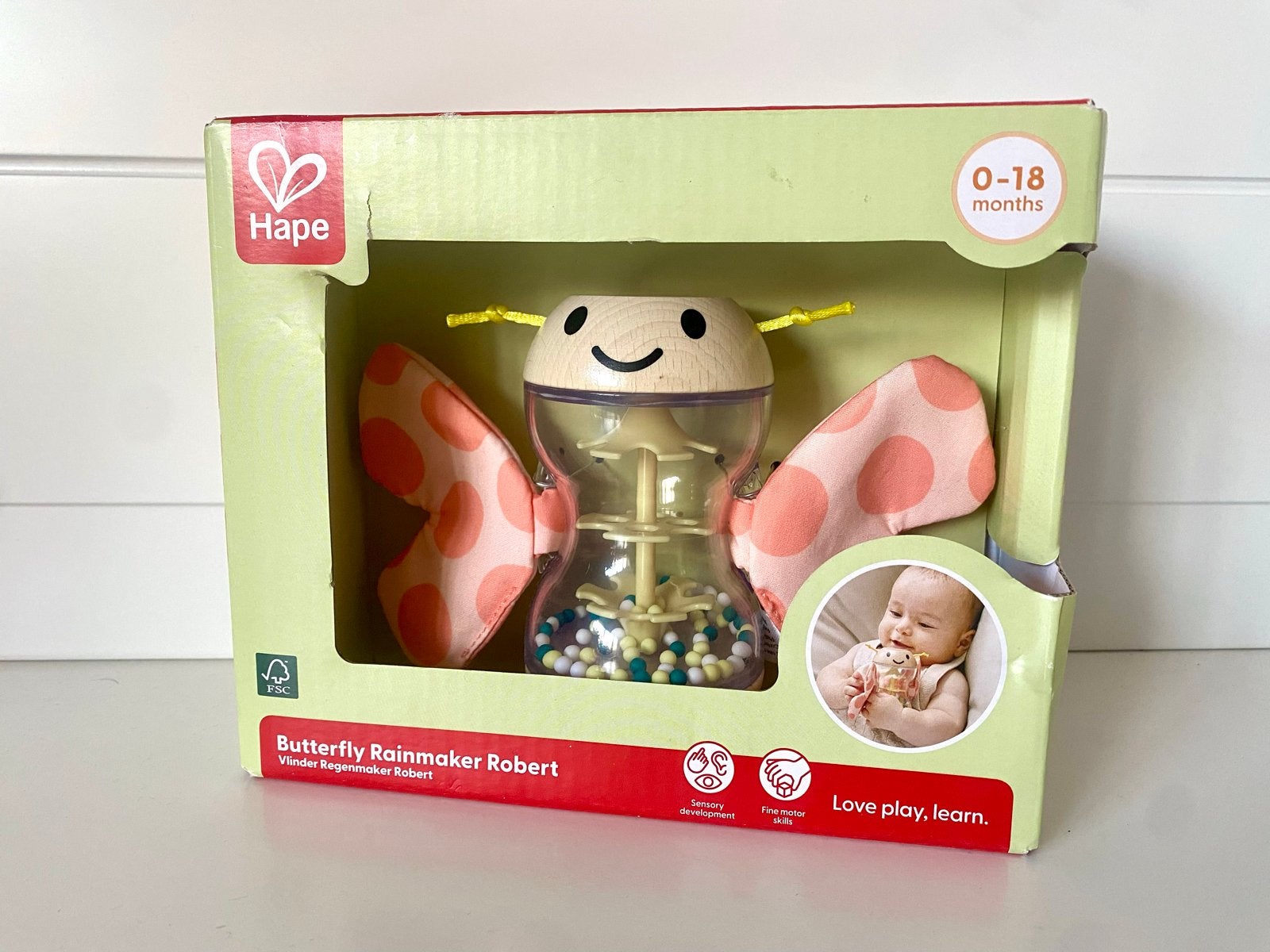 Hape Vlinder Regenmaker Robert - Baby Rammelaar Speelgoed, Ophalen of Verzenden, Zo goed als nieuw, Rammelaar, Met geluid