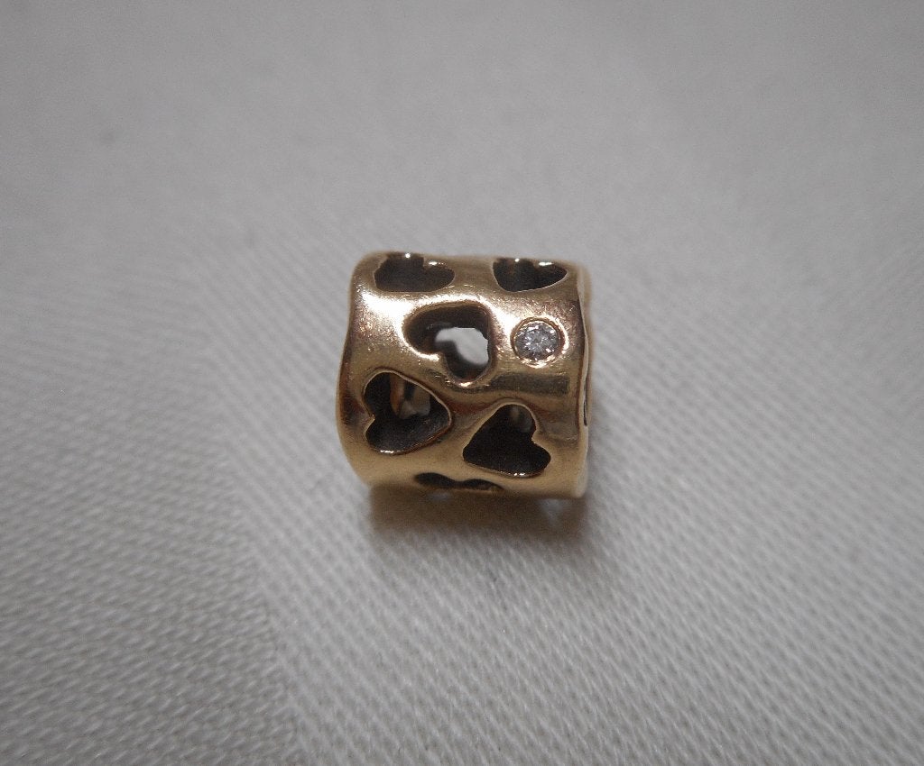 Pandora gouden bedel tunnel van liefde met diamant nr.447, Sieraden, Tassen en Uiterlijk, Verzenden, Pandora, Zo goed als nieuw