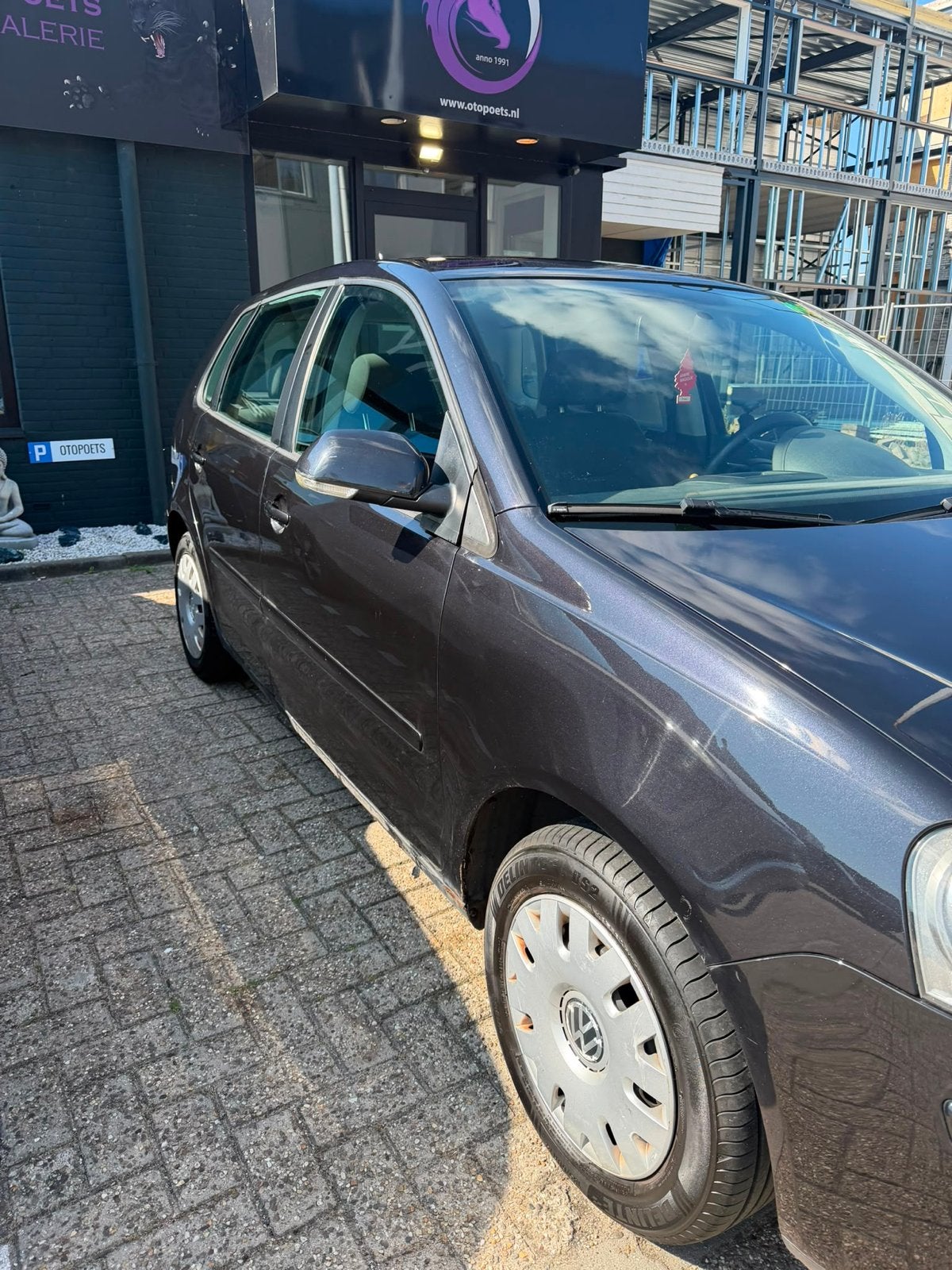 Volkswagen Polo 1.4 55KW 2005 Zwart, Auto's, Voorwielaandrijving, 15 km/l, Zwart, Origineel Nederlands