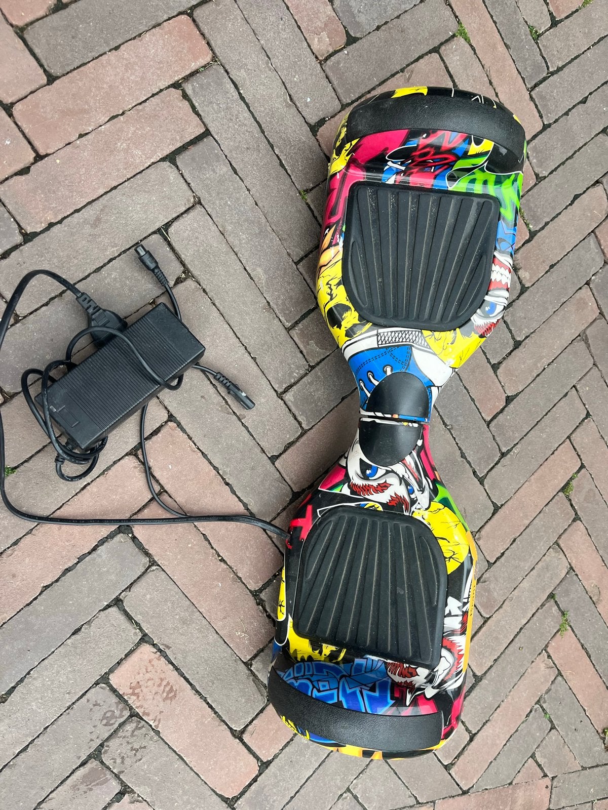 Hoverboard met graffiti design en oplader, Ophalen of Verzenden, Gebruikt, Overige typen