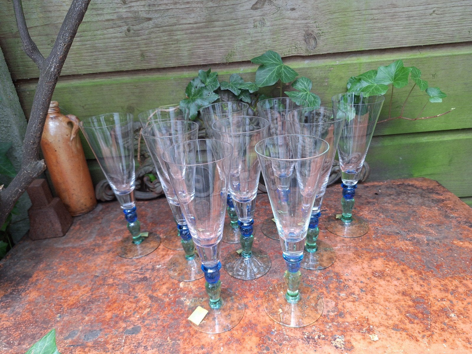 10 Mooie, Nieuwe wijnglazen met groen/ blauwe voet., Ophalen of Verzenden, Nieuw, Overige typen
