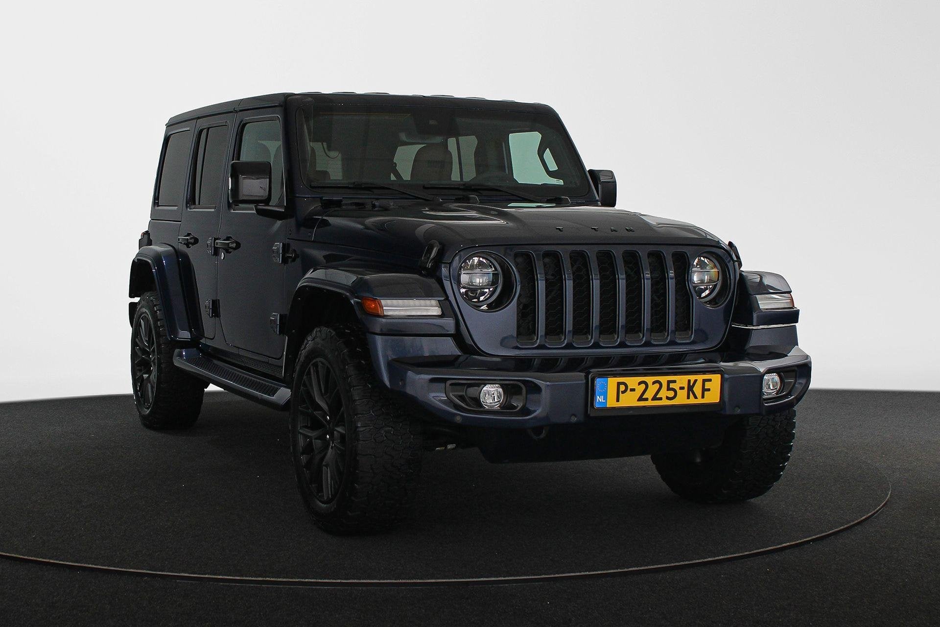 Jeep Wrangler 4xe 380pk TITAN, Auto's, Automaat, 4 cilinders, Cabriolet, Blauw