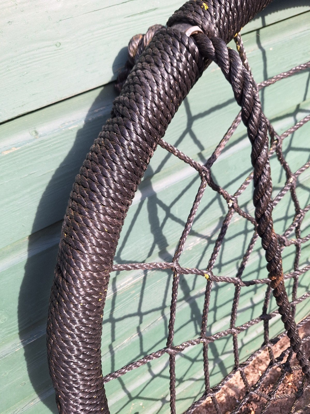 Nestschommel _ Netschommel, Ophalen