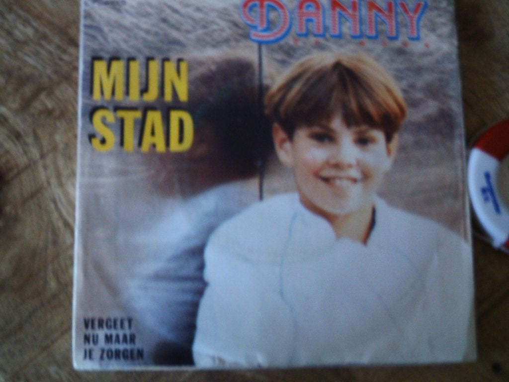 Danny de Munk - Mijn Stad /Vergeet Nu Maar Je Zorgen 6s, 7 inch, Ophalen of Verzenden, Zo goed als nieuw, Beschermende buitenhoes