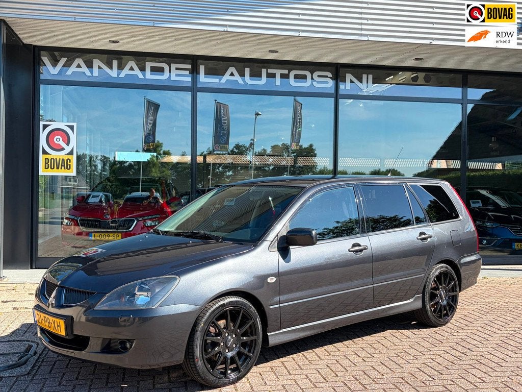 Mitsubishi Lancer Station Wagon 1.6 Sport Airco LM-Velgen NL, Auto's, Mitsubishi, Voorwielaandrijving, Stof, Zwart, 4 cilinders