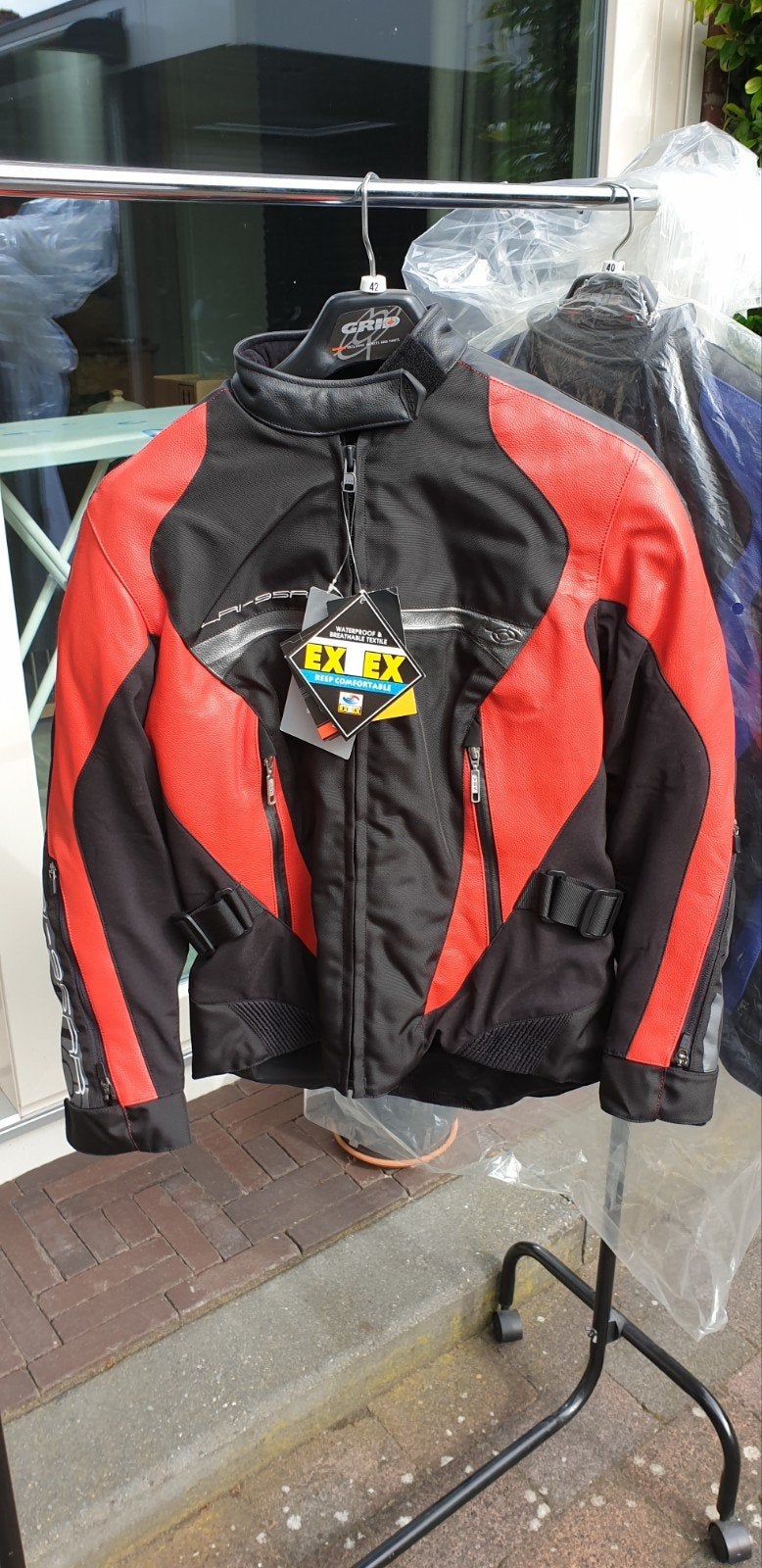 Motorjas dames Grid rood en blauw, Nieuw met kaartje, Jas | leer, Ophalen of Verzenden, GRID