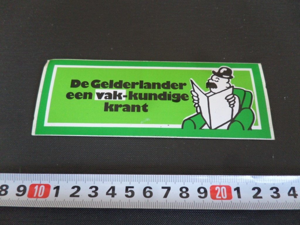 sticker de gelderlander een vak-kundige krant - strip, Ophalen, Zo goed als nieuw