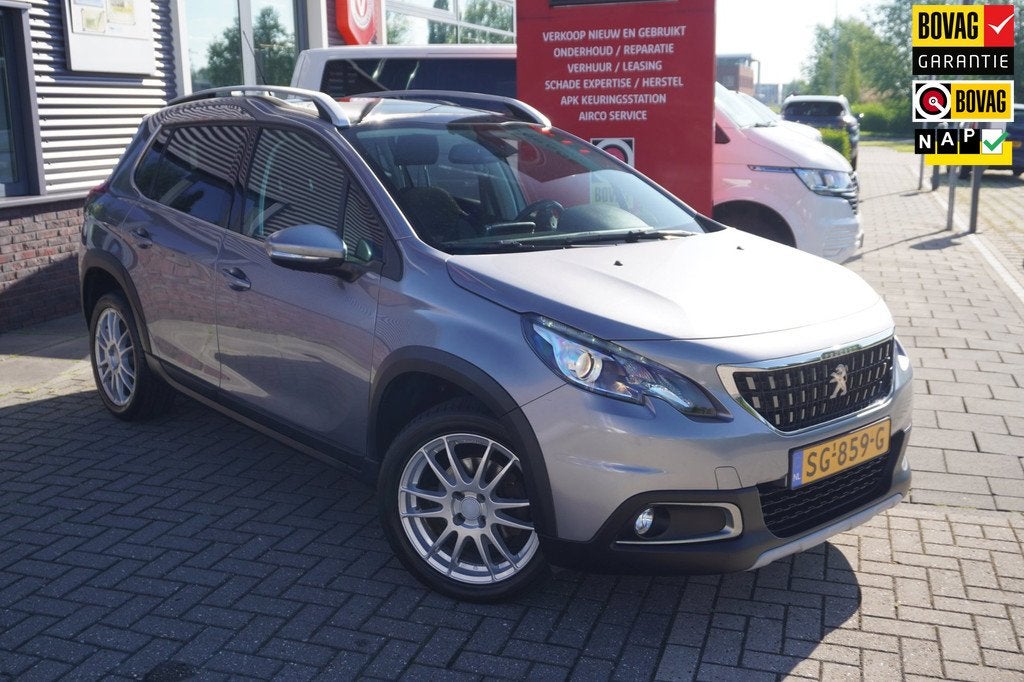 Peugeot 2008 1.2 PureTech Allure / Camera / Carplay / Pano /, Voorwielaandrijving, Leder en Stof, Origineel Nederlands, Bedrijf