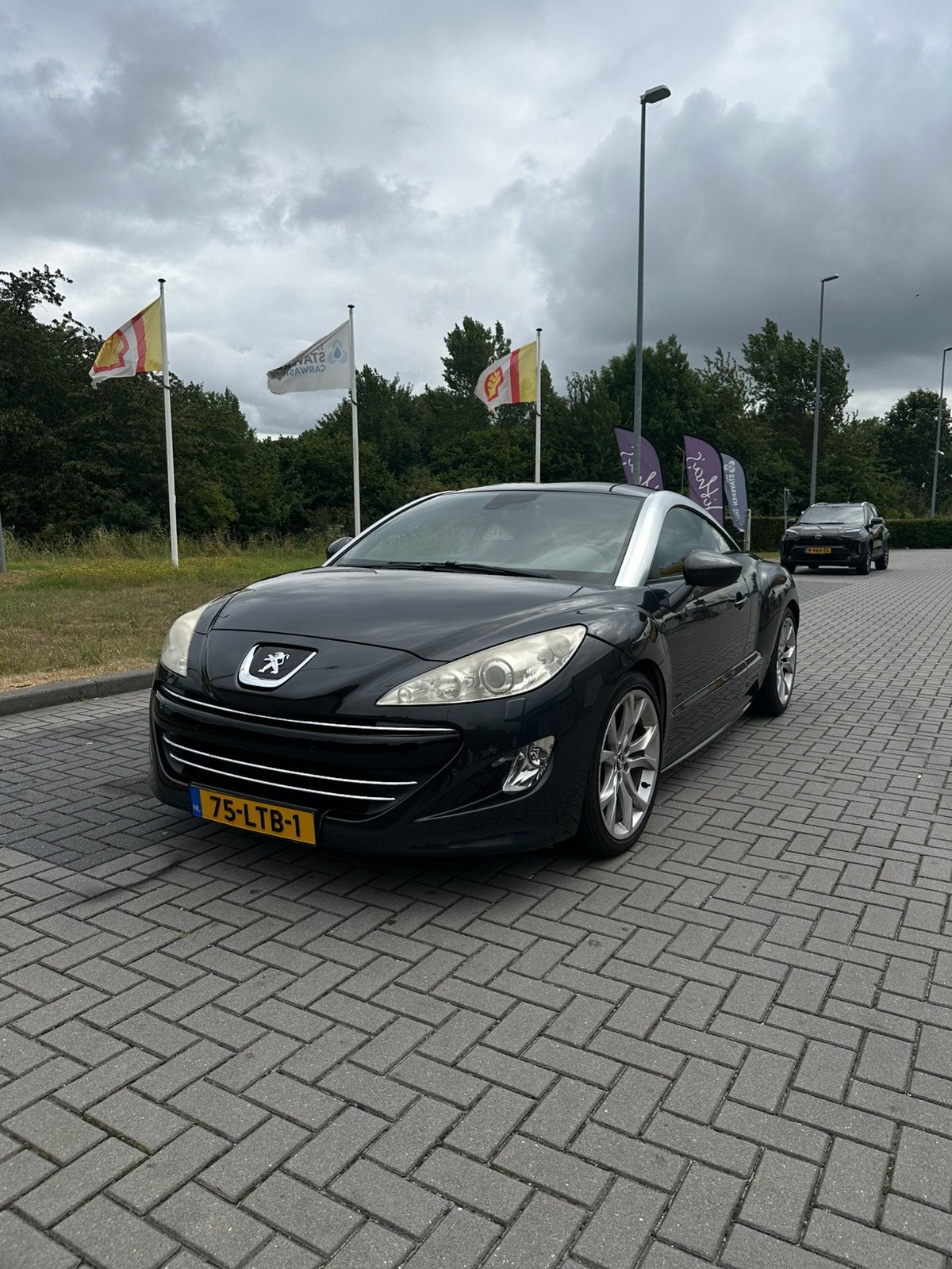 Peugeot RCZ 1.6 THP 2010 Grijs, Auto's, Peugeot, Voorwielaandrijving, 15 km/l, Zwart, 4 stoelen