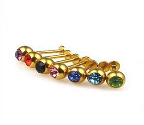 Nieuwe labret piercings met steentjes. Goud kleur., Ophalen of Verzenden, Nieuw, Staal