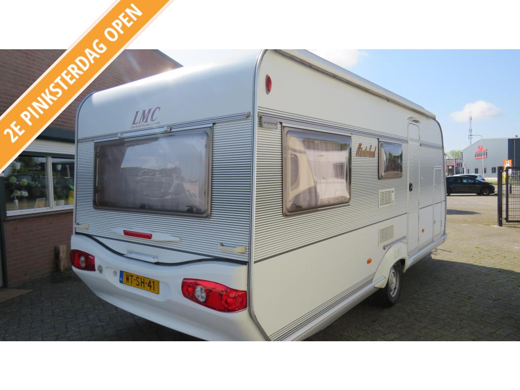 LMC MUNSTERLAND 530TK BJ 2003 STAPELBEDDEN €7999, Caravans en Kamperen, Niet ingevuld, Dwarsbed, Rondzit, Bedrijf