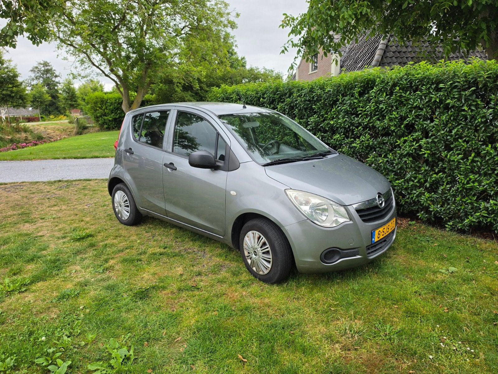 Opel Agila 1.0 12V 2012 Grijs, Auto's, Opel, Bedrijf, Agila, Benzine, A, Hatchback, Handgeschakeld, Geïmporteerd, Zilver of Grijs