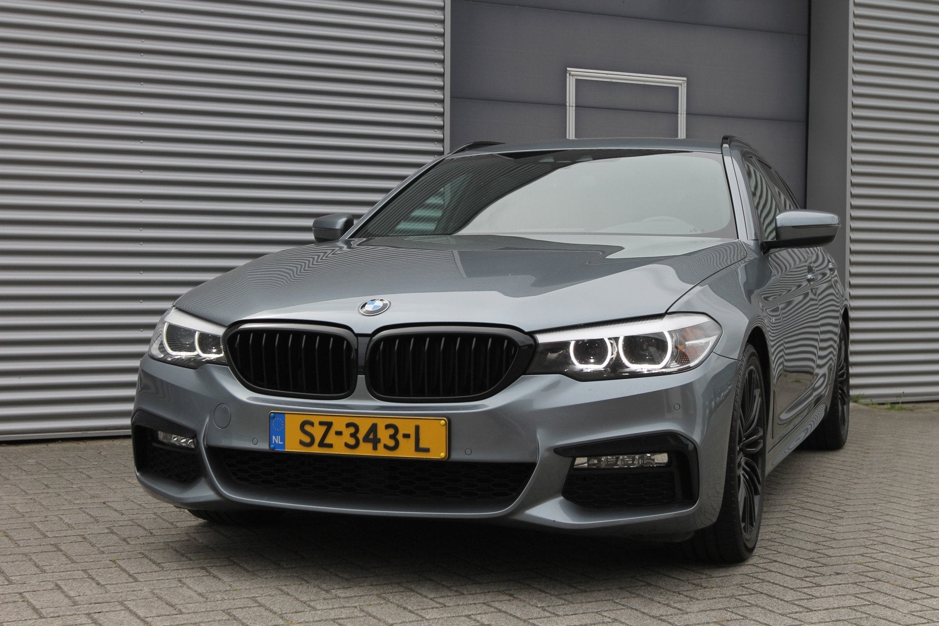 BMW 5 Serie Touring 520d High Executive Aut. I M-Pakket I Na, Auto's, Automaat, 2000 kg, Leder en Stof, Origineel Nederlands