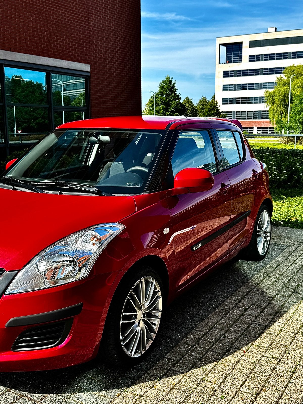 Suzuki Swift 1.2 5-D 2012 Rood 97000 NAP, Voorwielaandrijving, 4 cilinders, 400 kg, Swift