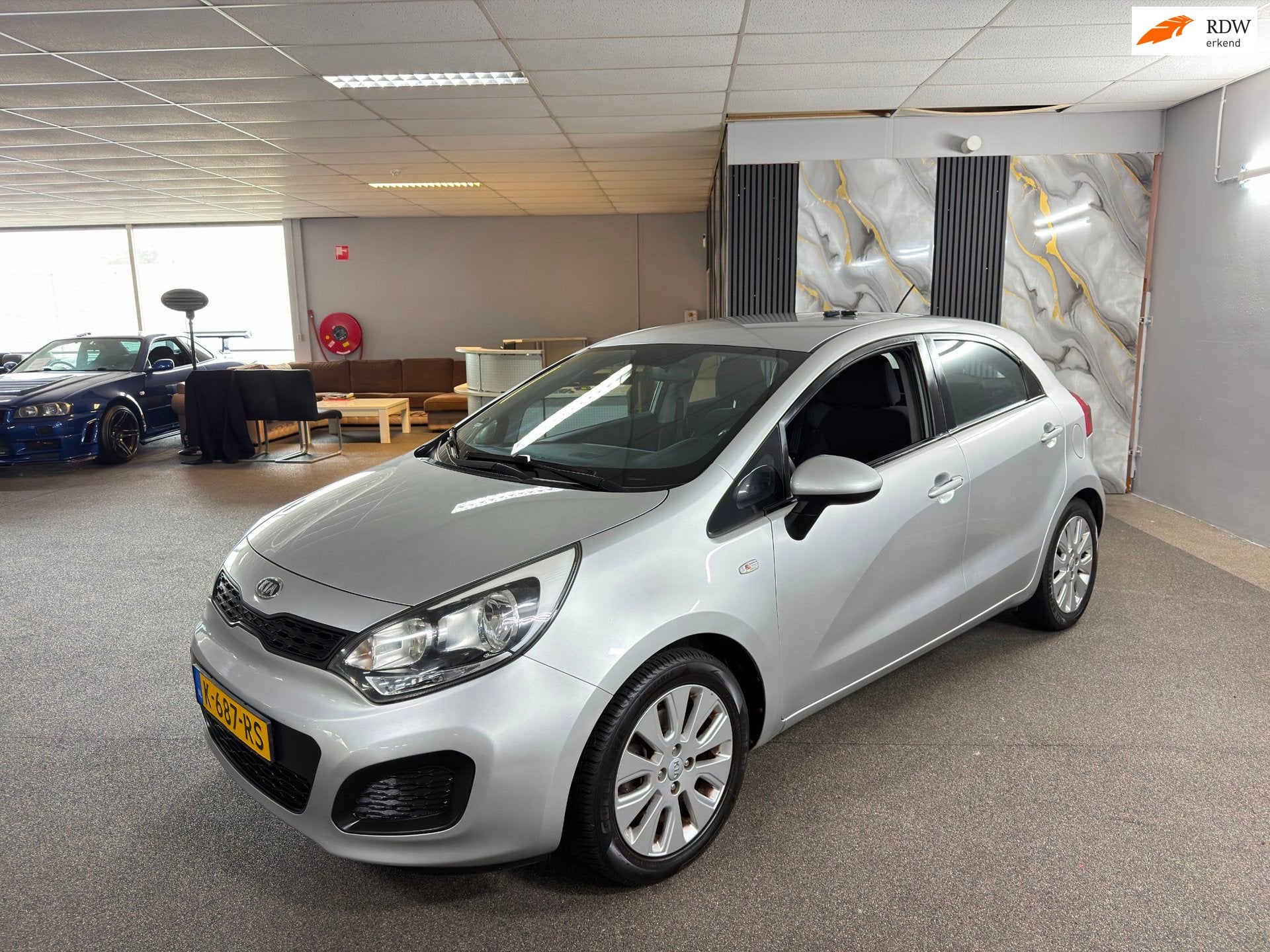 Kia Rio 1.4 CVVT Comfort Pack Apk Nieuw,Cruise,Clima,N.A.P,T, Auto's, Voorwielaandrijving, Euro 5, Zwart, 1396 cc