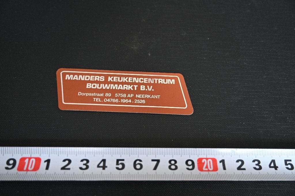 sticker folie neerkant MANDERS KEUKENCENTRUM BOUWMARKT, Ophalen of Verzenden, Zo goed als nieuw