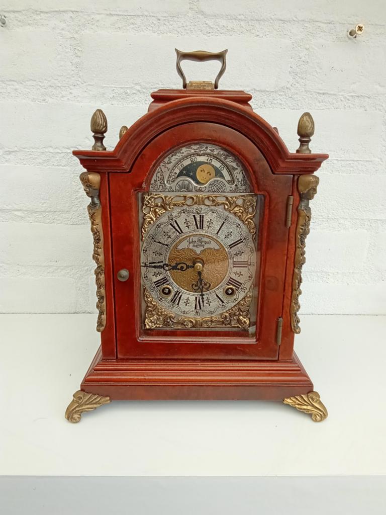 Engels tafel klokje van John Thomas., Ophalen