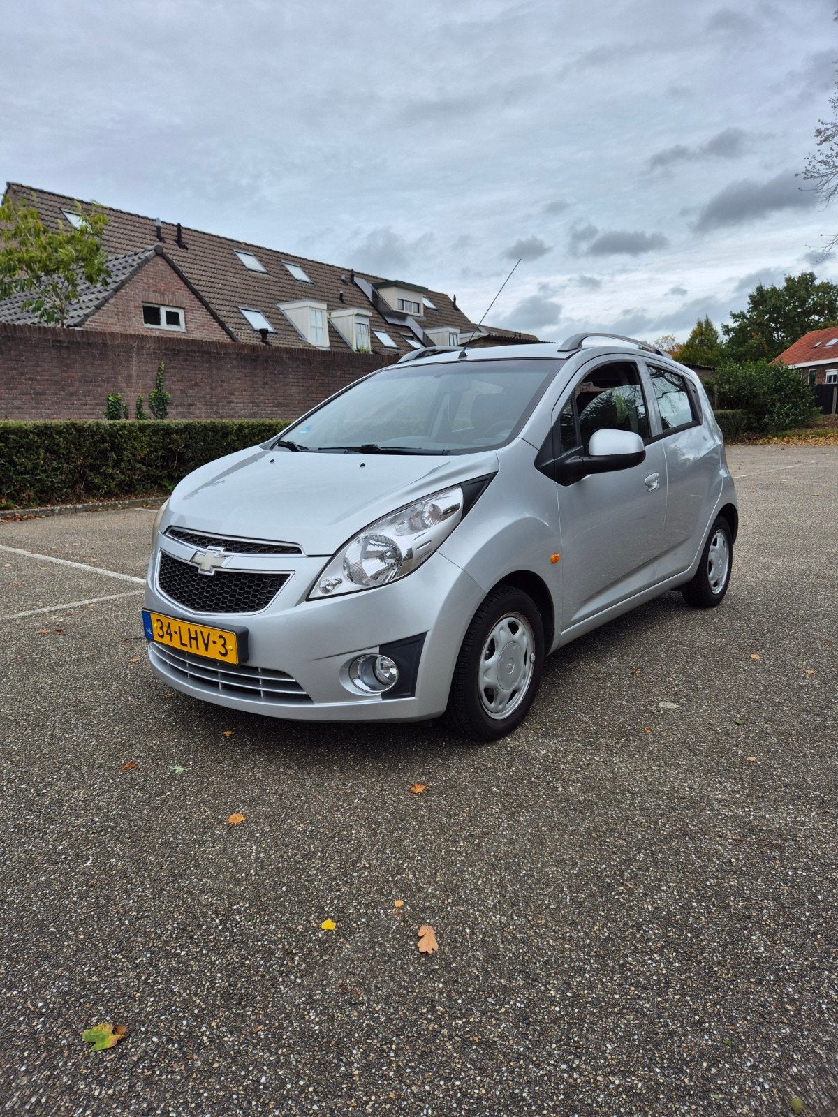 Chevrolet Spark 1.0 2010 Grijs airco elektrische ramen, Auto's, Voorwielaandrijving, 839 kg, 4 cilinders, 68 pk