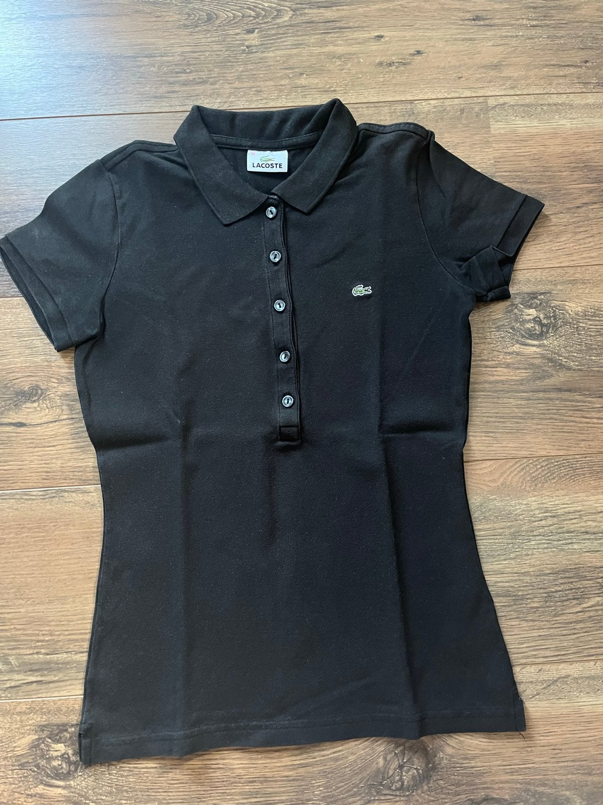 Zwarte Lacoste polo maat 36 (S) - Tijdloze klassieker, Kleding | Dames, Zwart, Ophalen of Verzenden, Zo goed als nieuw, Korte mouw