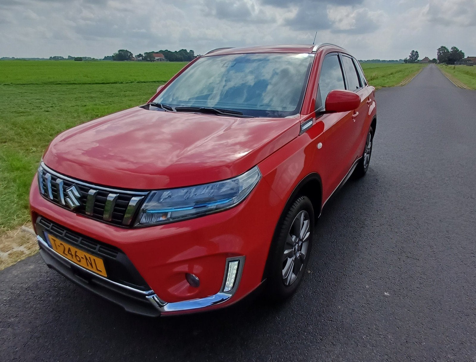 Suzuki Vitara 1.4 Boosterjet 129pk Smart Hybrid 2023 Rood, Stof, 4 cilinders, 129 pk, Automatische klimaatregeling