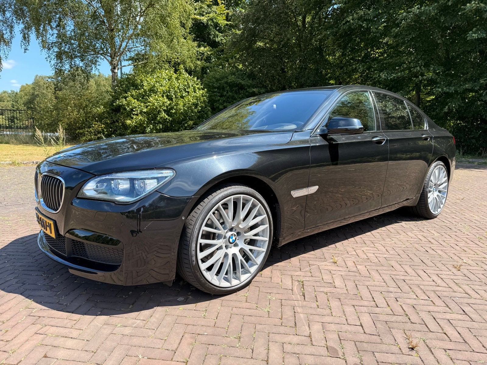 BMW 7-Serie 3.0 740i Activehybrid AUT 2015, Automaat, Euro 5, Zwart, Open dak