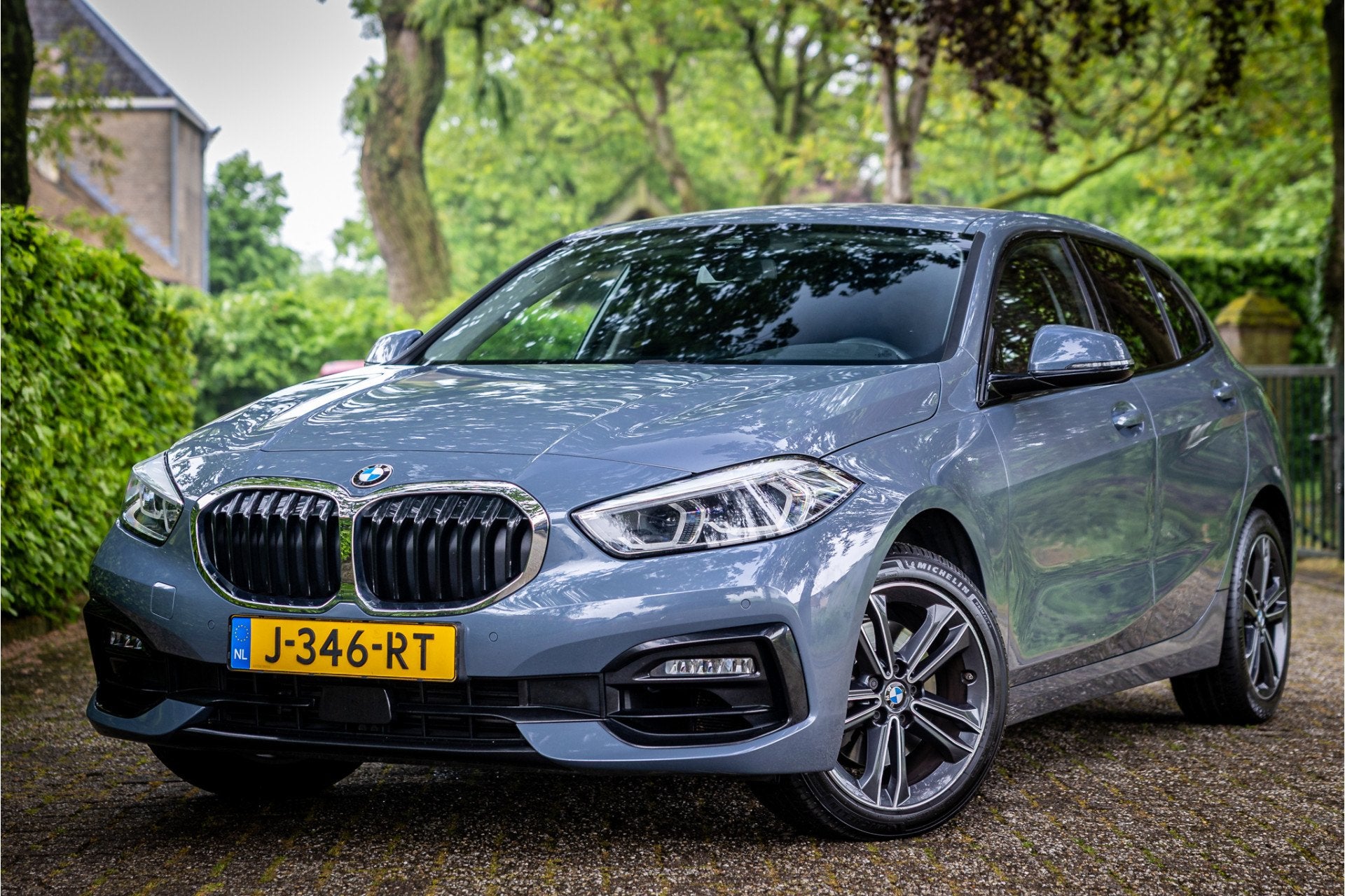 BMW 1-serie 118i Executive Sport Line Individual Storm Bay S, Stof, Gebruikt, Automatische klimaatregeling, Origineel Nederlands