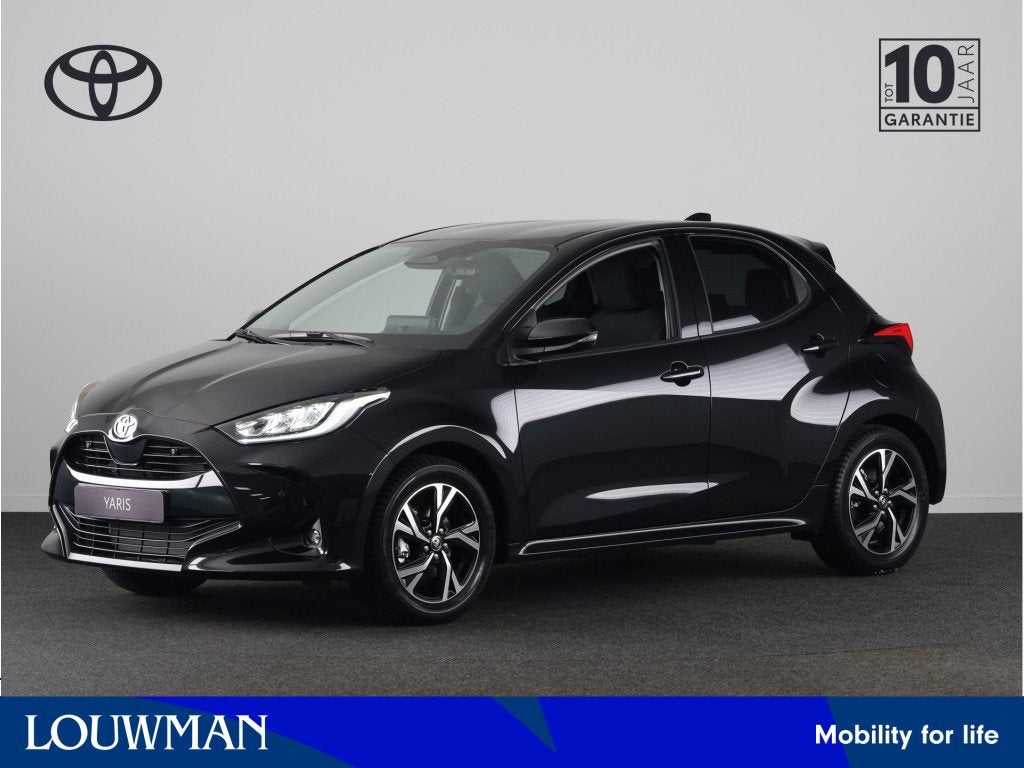 Toyota Yaris 1.5 Hybrid 115 Dynamic *Demo* (bj 2025), 12 maanden, Zwart, 1490 cc, Grijs