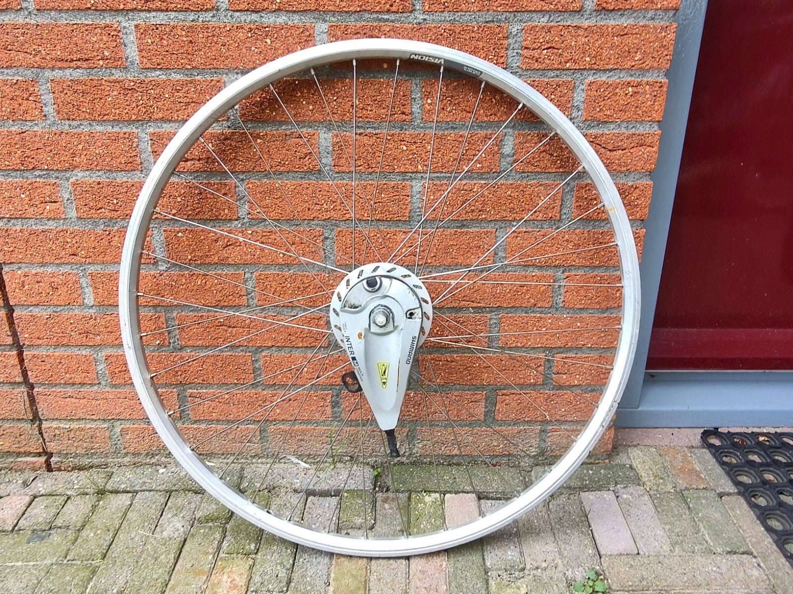 28 inch voorwiel met naafdynamo en rollerbrake, Fietsen en Brommers, Elektrische fiets, Gebruikt, Shimano, Ophalen