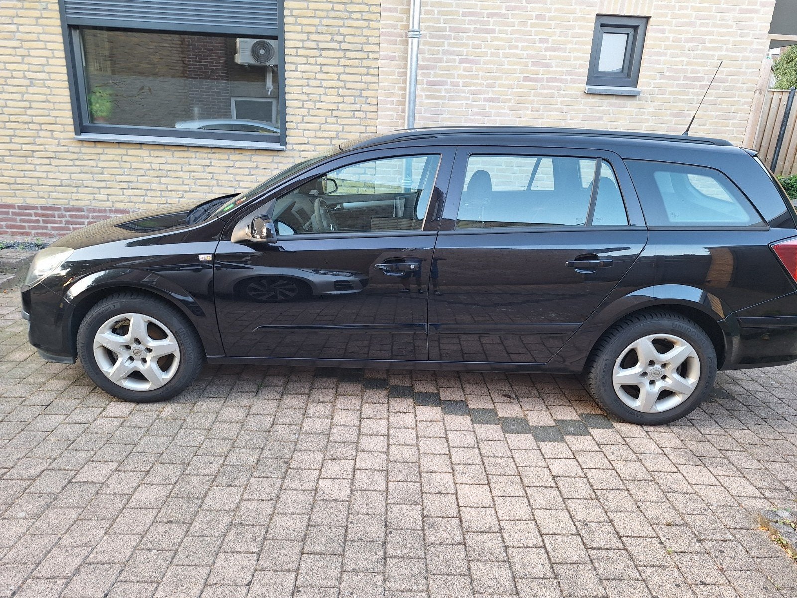 Opel Astra 1.6 16V St.wgn. 2007 Zwart, Auto's, Voorwielaandrijving, 15 km/l, Zwart, 4 cilinders