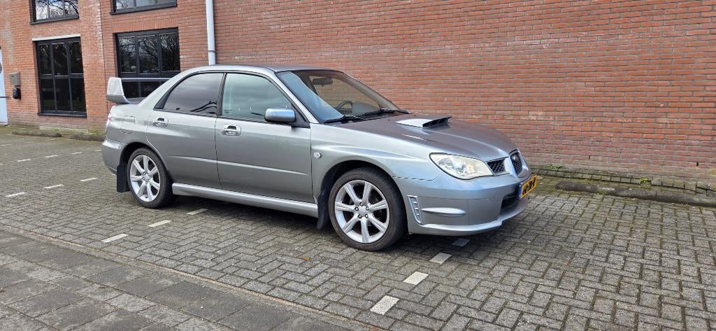 Subaru Impreza 1.5 AWD 2008 Grijs, 13 km/l, 1498 cc, 4 cilinders, Origineel Nederlands
