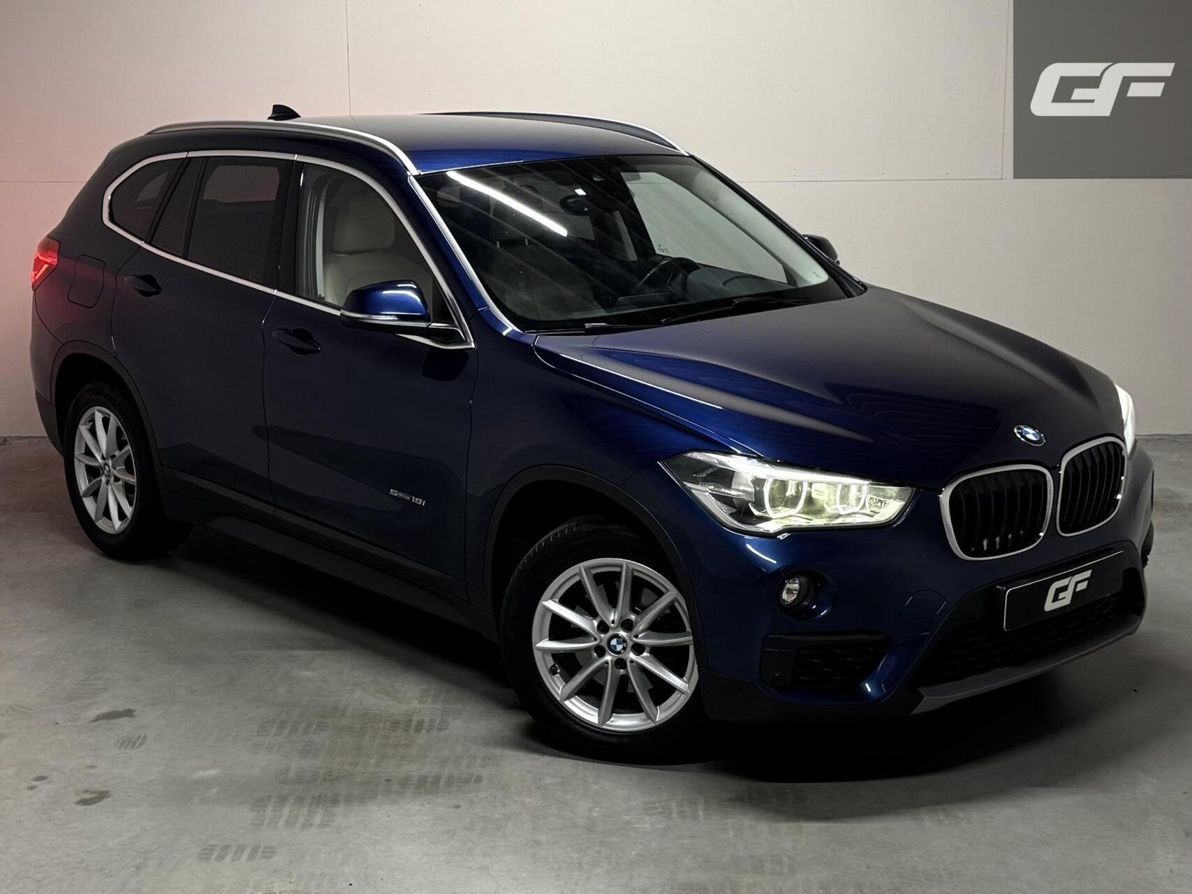 BMW X1 sDrive18i High Executive Leer Navi Cruise Trekh. NAP, Gebruikt, Met garantie (alle), Blauw, Leder