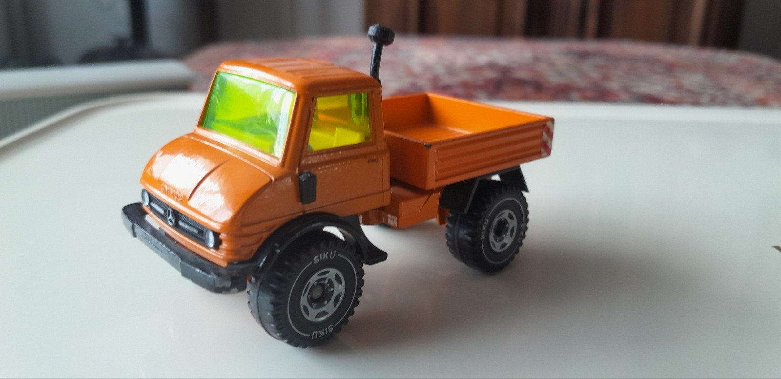 Siku Unimog oranje., Ophalen of Verzenden, Zo goed als nieuw, Tractor of Landbouw, SIKU