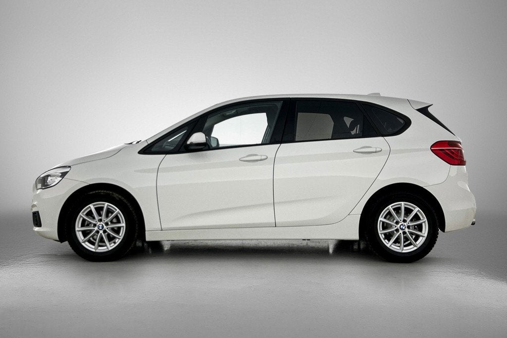 BMW 2-serie Active Tourer 216i Executive (NAVIGATIE, PARKEER, Auto's, BMW, Gebruikt, Euro 6, Wit, Bedrijf