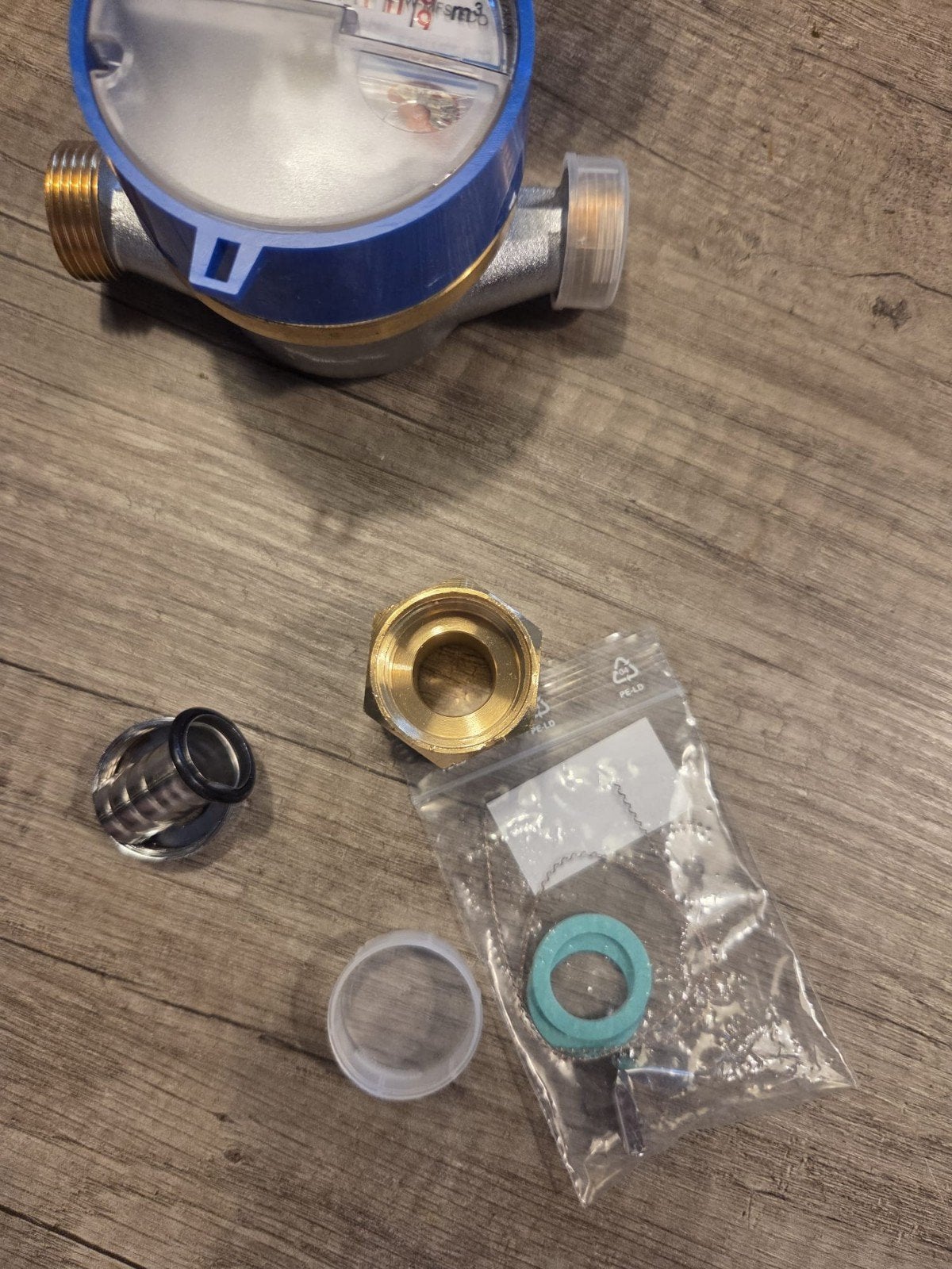 Nieuwe watermeter met aansluitstukken, Ophalen