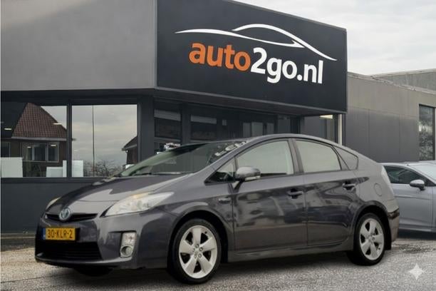 Toyota Prius 1.8 ASPIRATION AUT NAVI AIRCO HEAD-UPP LED LMV, Auto's, Gebruikt, 4 cilinders, Alcantara, Origineel Nederlands