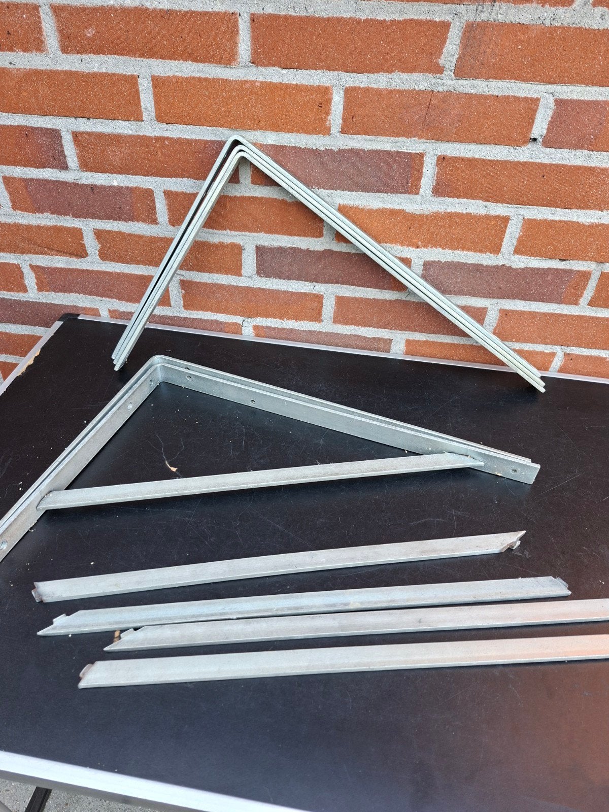 Metalen Plankenbeugels, Ophalen