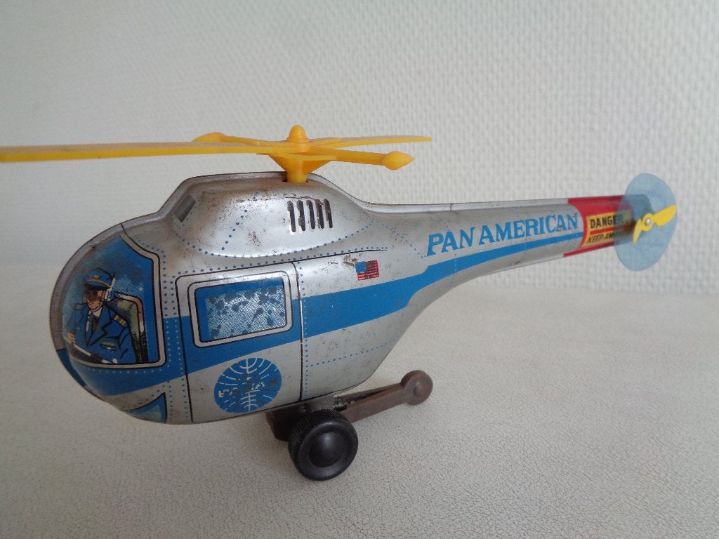 Helicopter van blik. Made Japan.  22 cm lang., Ophalen of Verzenden