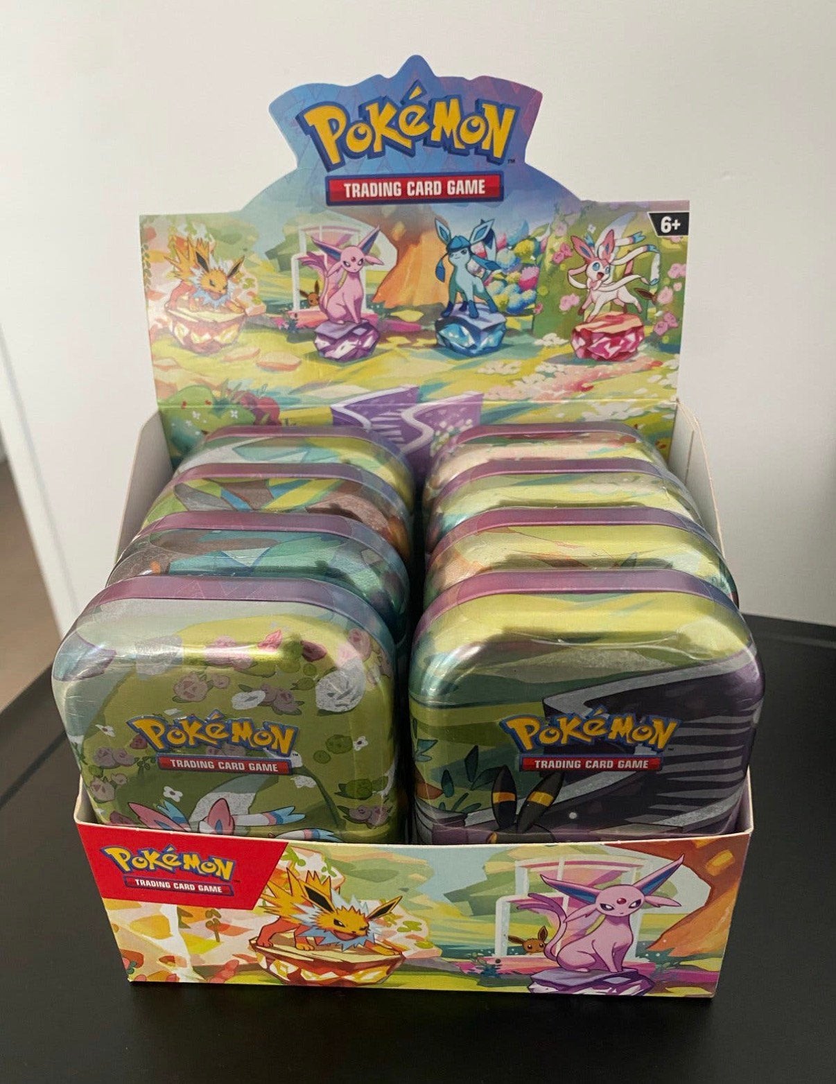 Prismatic Evolutions mini tins 8 stuks 16 boosterpacks, Ophalen of Verzenden, Zo goed als nieuw
