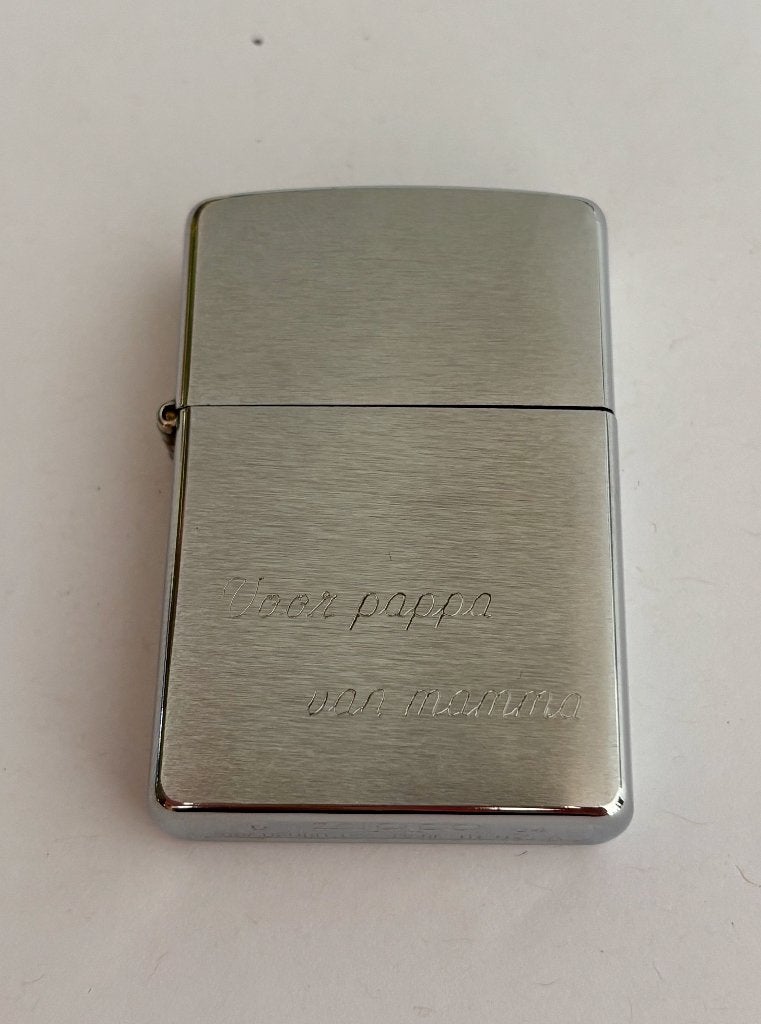 Zippo als nieuw met gravering, Ophalen of Verzenden, Zo goed als nieuw, Aansteker