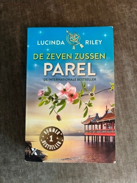 De zeven zussen - Parel, Boeken, Ophalen of Verzenden, Zo goed als nieuw, Lucinda Riley
