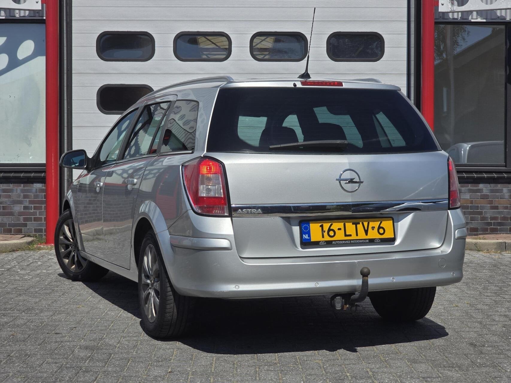 Opel Astra Wagon 1.6 111 years Edition Navi/Airco/Trekhaak, Auto's, Voorwielaandrijving, Gebruikt, 116 pk, Parkeersensor
