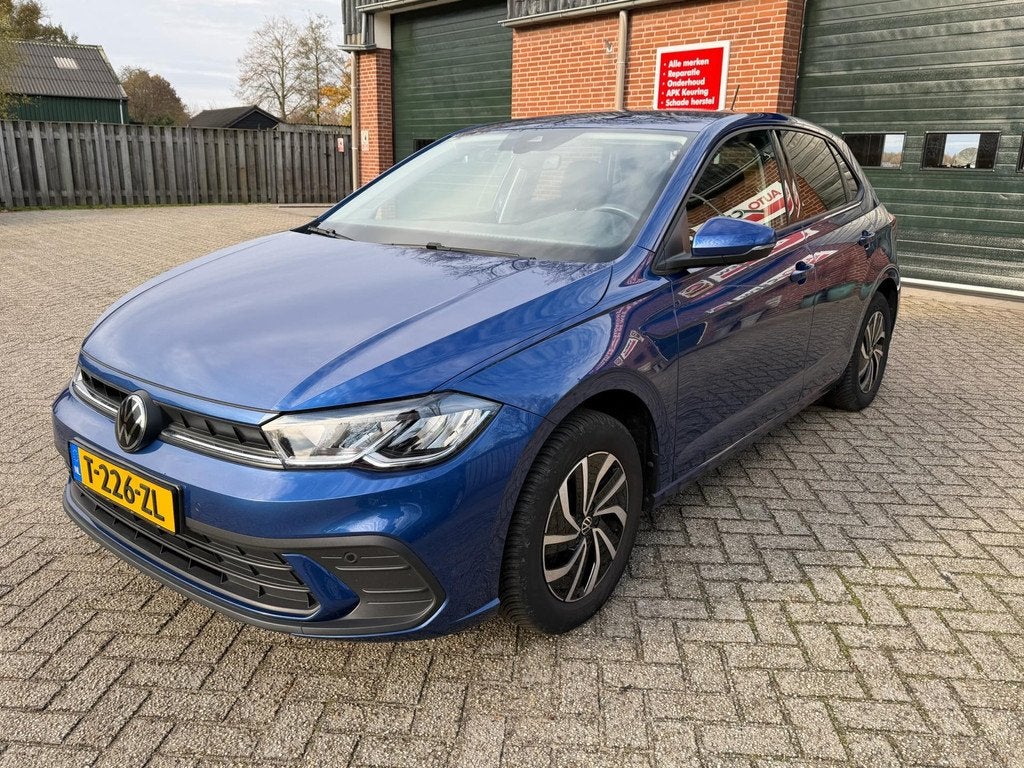 Volkswagen Polo 1.0 TSI Life Carplay Parkeersensoren Digital, Auto's, Voorwielaandrijving, Stof, Gebruikt, Blauw