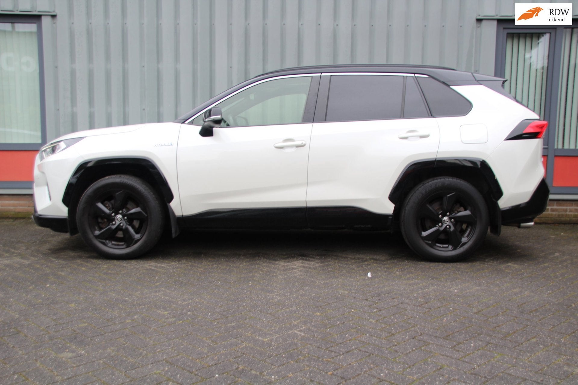 Toyota RAV4 2.5 Hybrid Bi-Tone Panorama dak, Gebruikt, Zwart, Leder en Stof, Wit