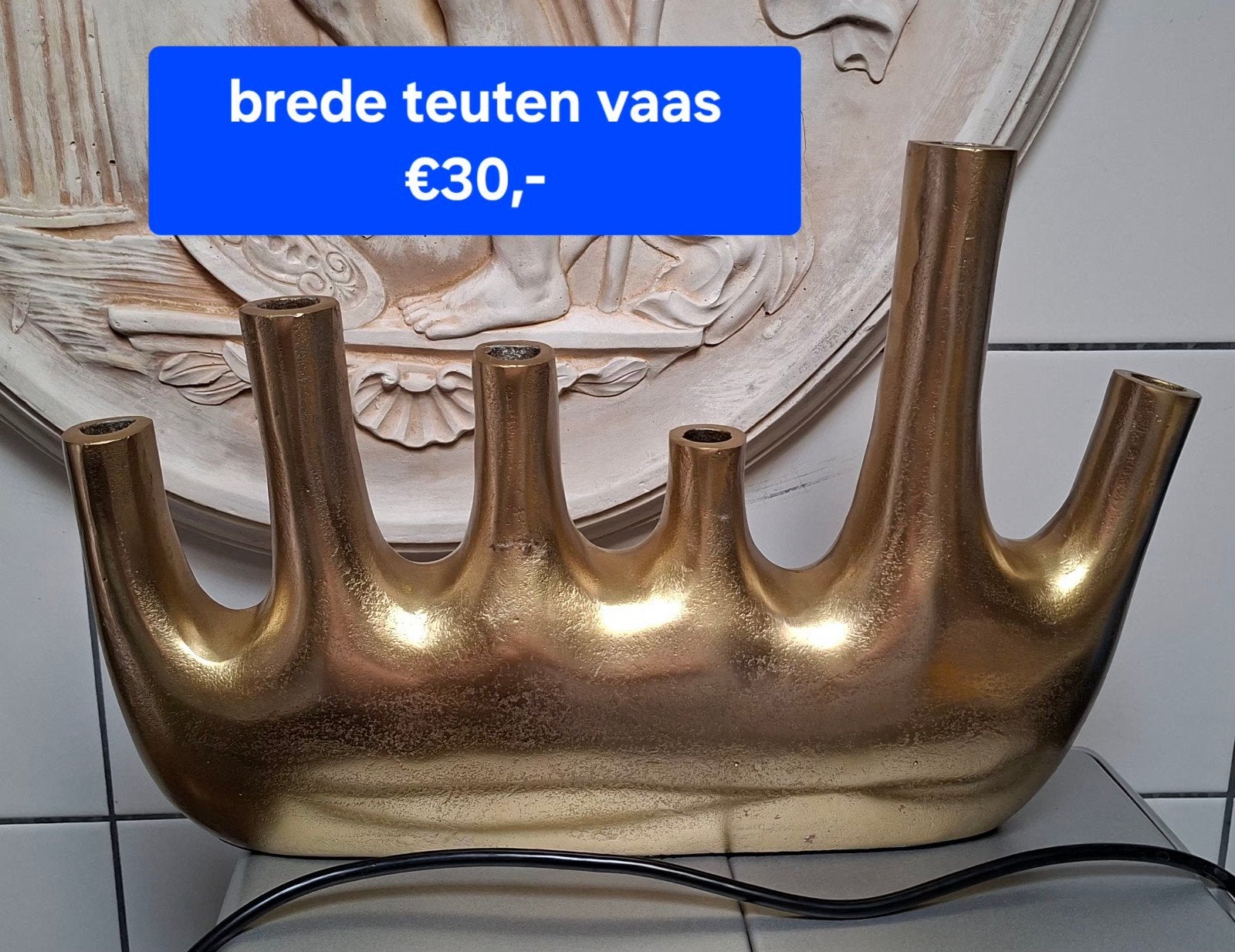 Rechte gouden tulpen vaas, Ophalen