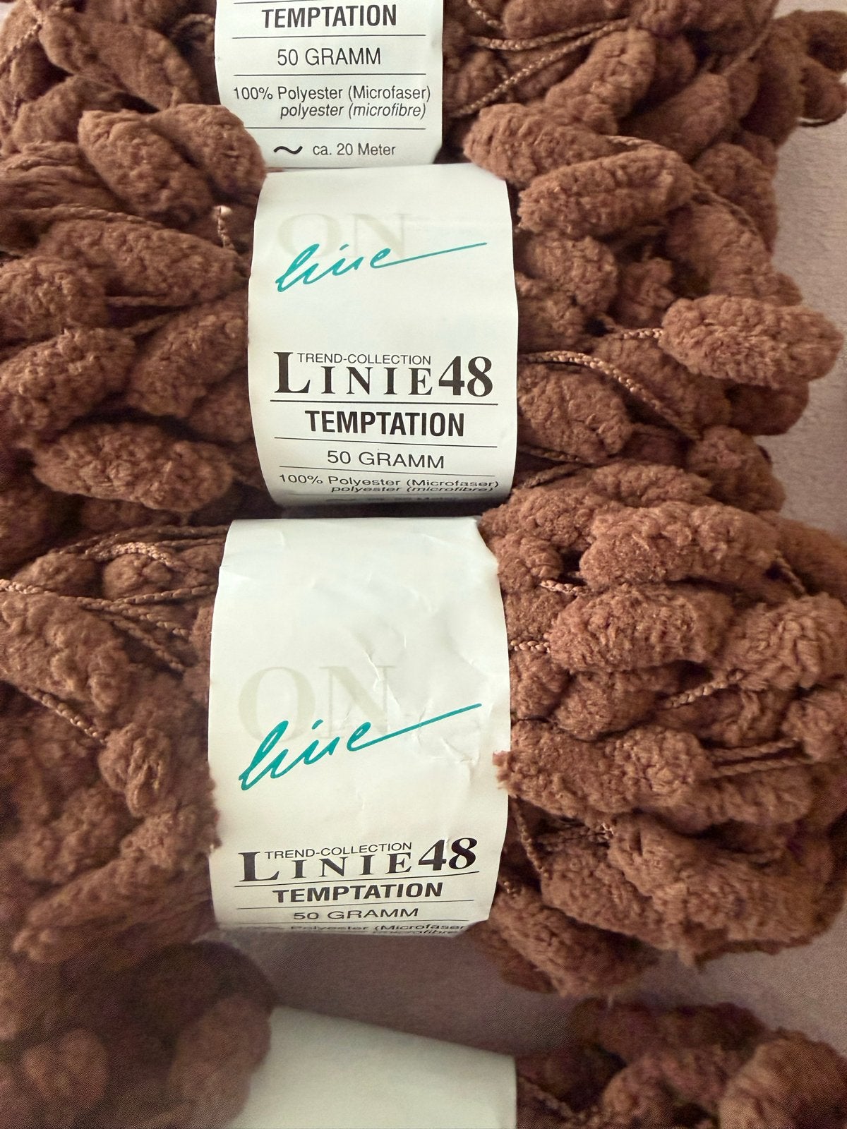 Bruine Line 48 Temptation Wol - 50 gram bollen, Ophalen of Verzenden, Nieuw, Breien of Haken, Wol of Garen