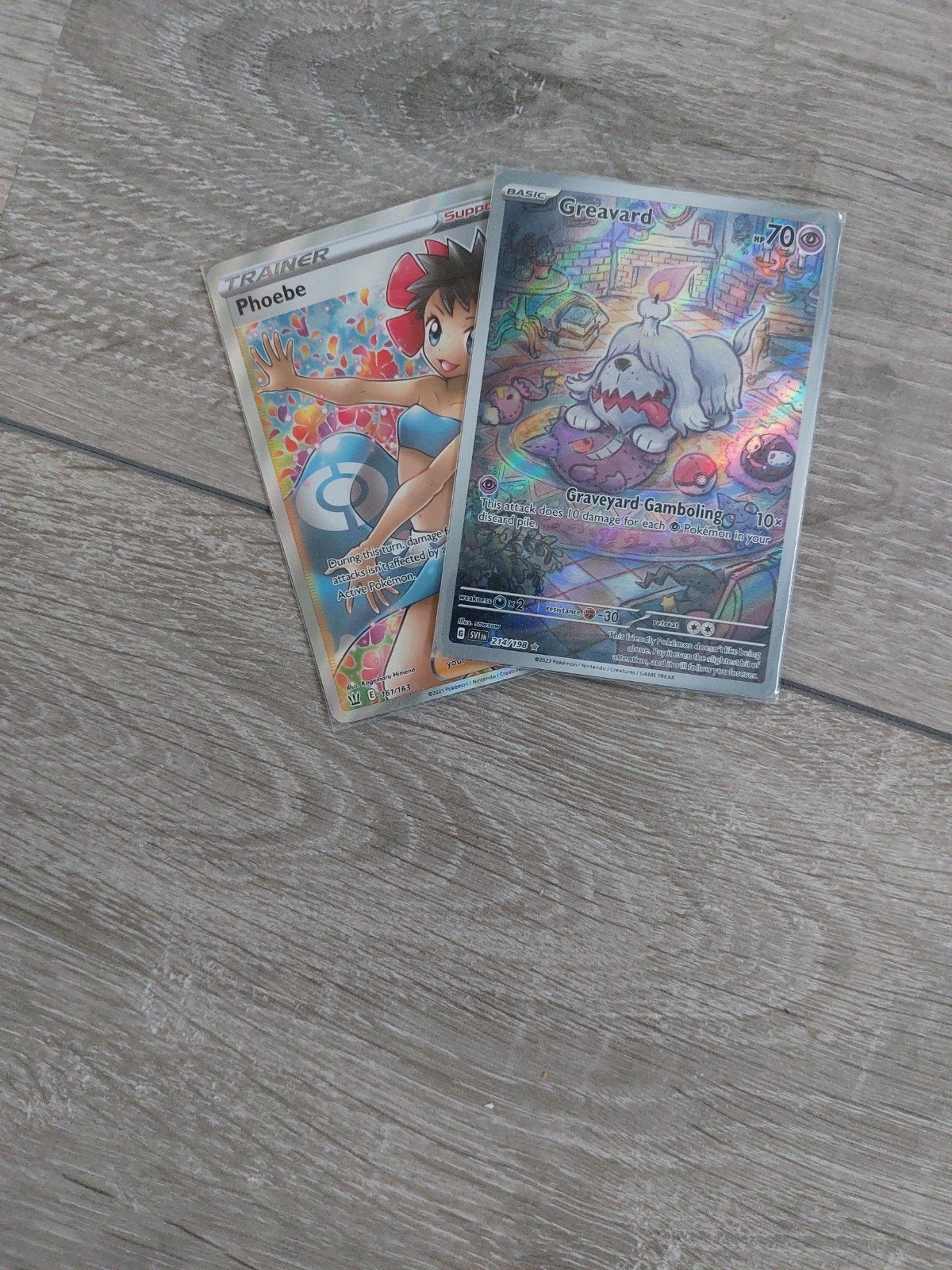 pokemon kaarten Phoebe trainer en Greavard illustration, Hobby en Vrije tijd, Verzenden, Zo goed als nieuw, Meerdere kaarten, Foil