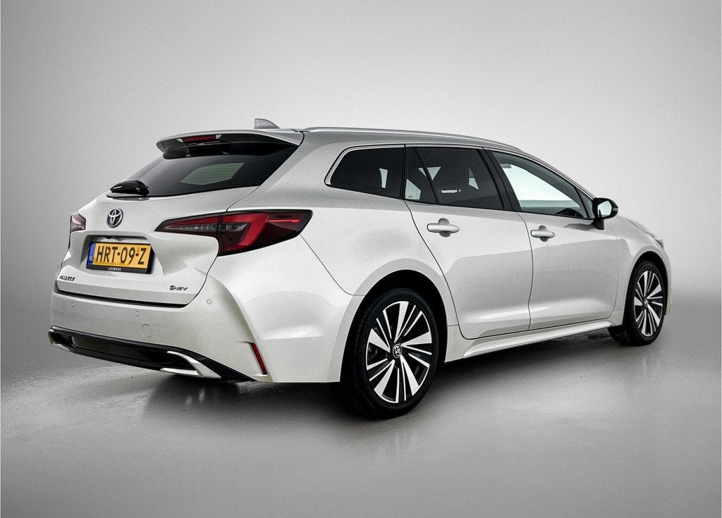 Toyota Corolla Touring Sports Hybrid 140 Dynamic | NL dealer, Auto's, Toyota, 12 maanden, 450 kg, Gebruikt, 4 cilinders