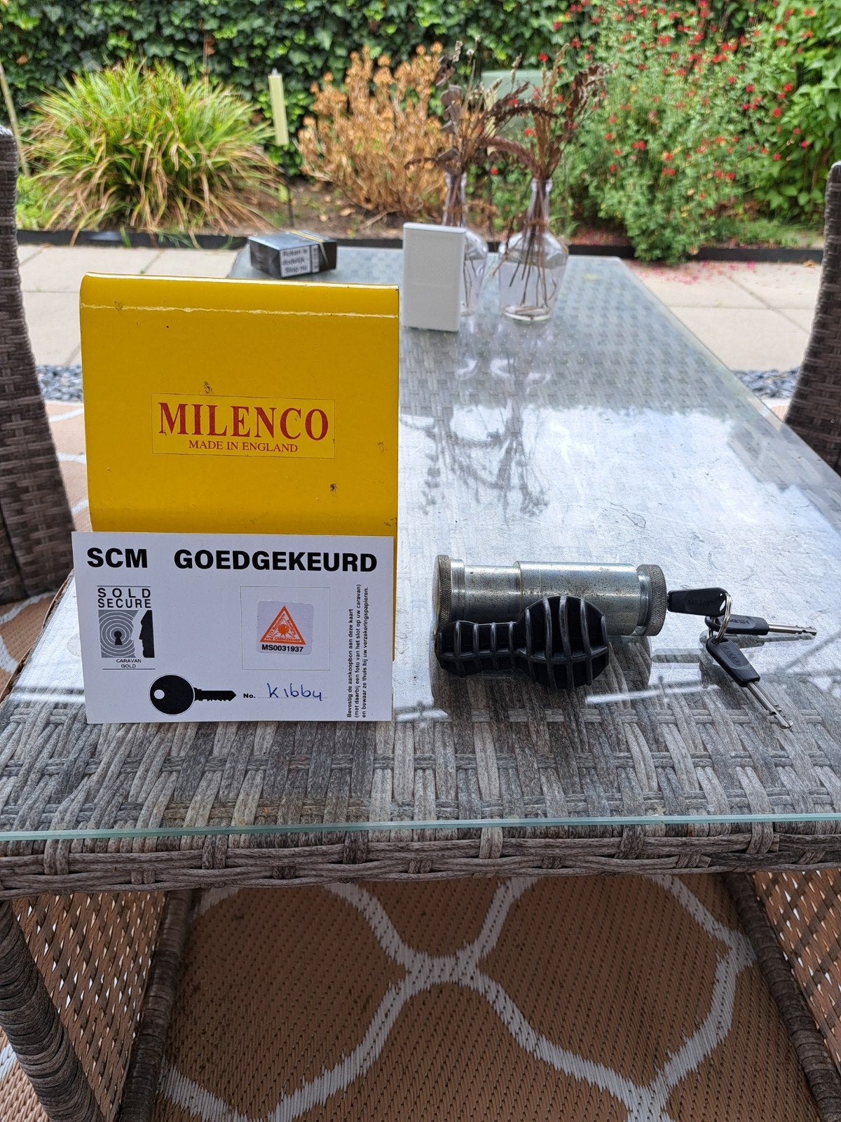 Milenco slot met certificaat voor caravan, Ophalen