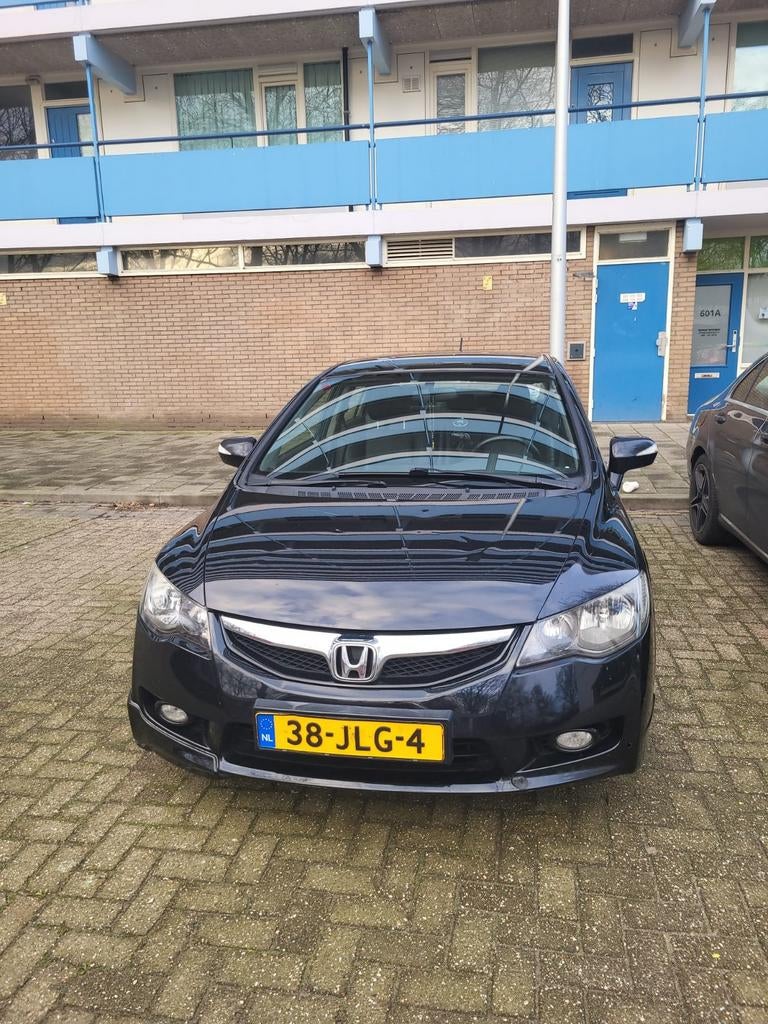 Honda Civic 1.3 Vtec Hybrid 4DR C-tr. 2009 Zwart, Auto's, Zwart, 22 km/l, Sedan, 1339 cc