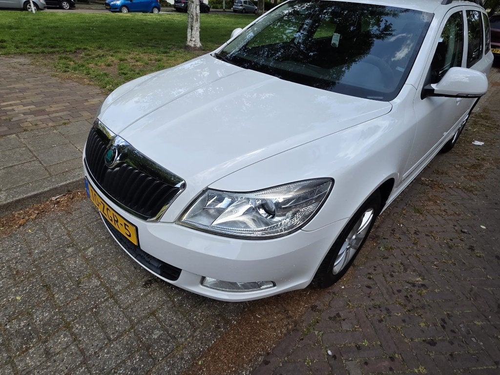 Skoda Octavia Combi 1.2 TSI Ambition Bus. Line Android Apple, Auto's, Voorwielaandrijving, Euro 5, Stof, 4 cilinders